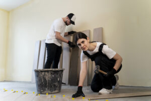 full-shot-people-tiling-floor-300x200.jpg
