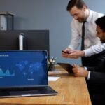 business-person-looking-finance-graphs (1)