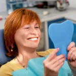 The Root-Like Benefits of Dental Implants: A Superior Alternative to Dentures in Alabama
